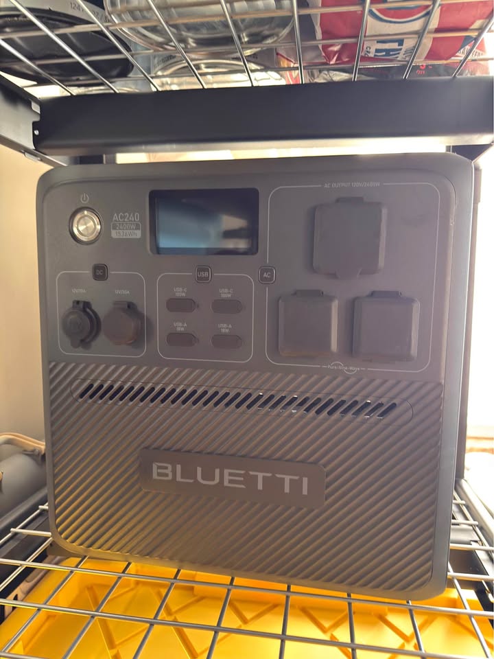 Bluetti AC240 portable power station shown in a real-world home setting
